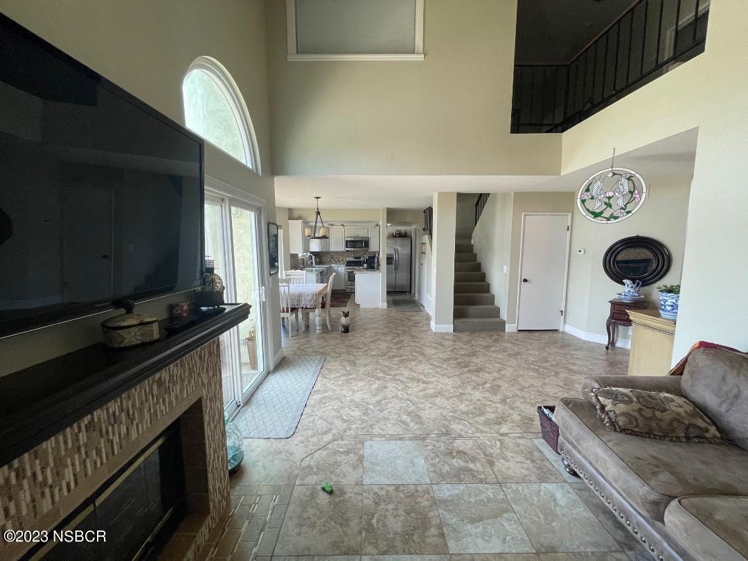 1108 Honeysuckle Way Lompoc, CA 93436 - Photo 14 of 54 a living room with furniture and a flat screen tv