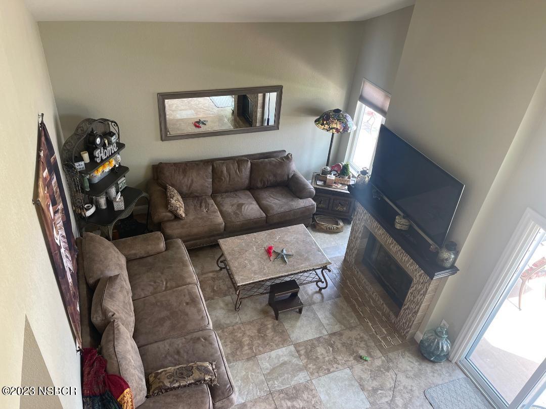 1108 Honeysuckle Way Lompoc, CA 93436 - Photo 35 of 54 a living room with furniture and a flat screen tv