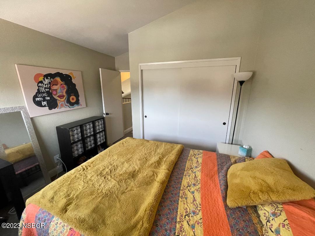 1108 Honeysuckle Way Lompoc, CA 93436 - Photo 40 of 54 a bedroom with a bed and a flat screen tv