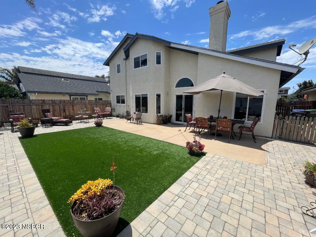 1108 Honeysuckle Way Lompoc, CA 93436 - Photo 51 of 54 a front view of a house with a garden and patio