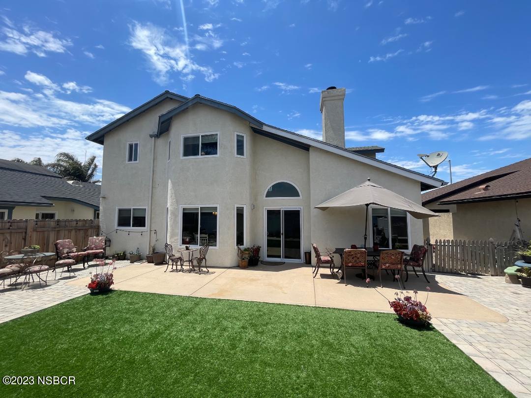 1108 Honeysuckle Way Lompoc, CA 93436 - Photo 52 of 54 a view of a yard with furniture and a fire pit