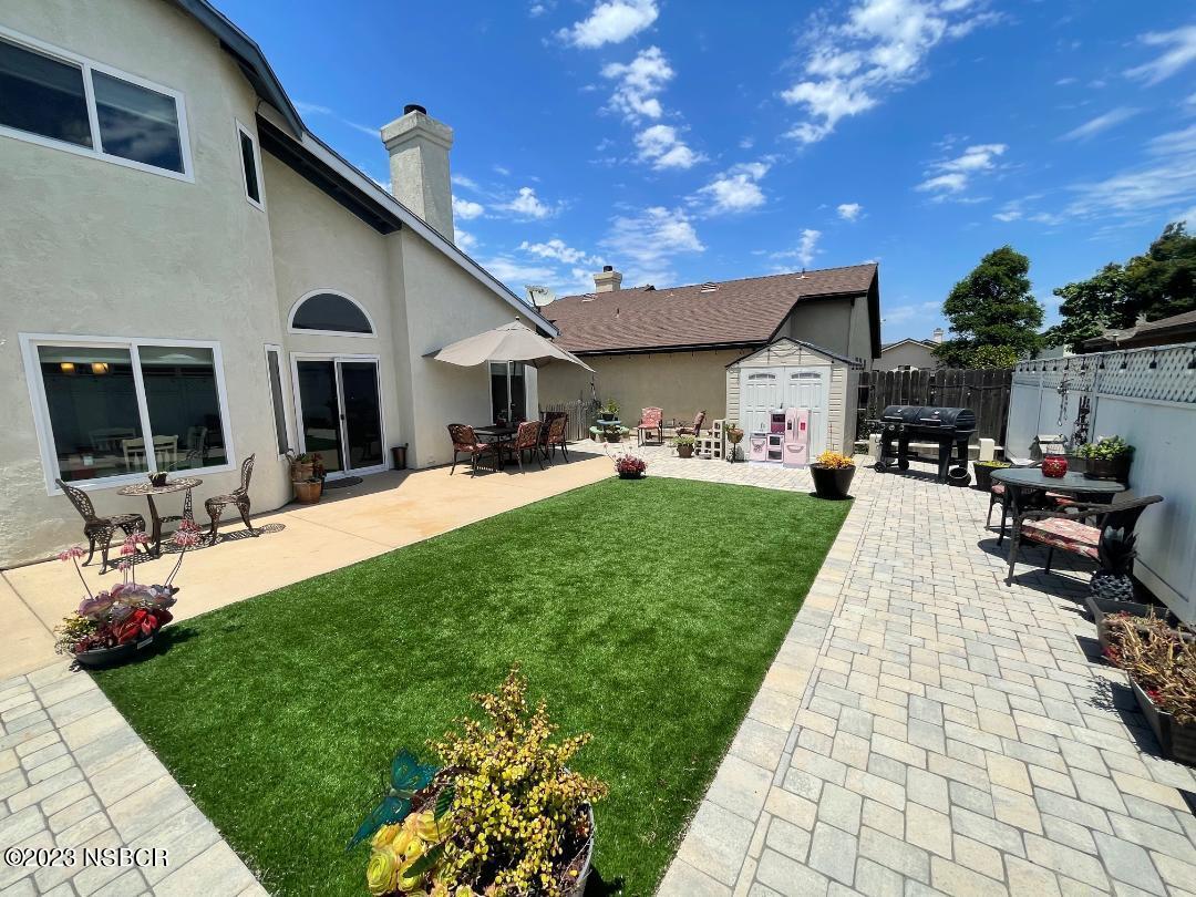 1108 Honeysuckle Way Lompoc, CA 93436 - Photo 54 of 54 a front view of a house with a garden and patio