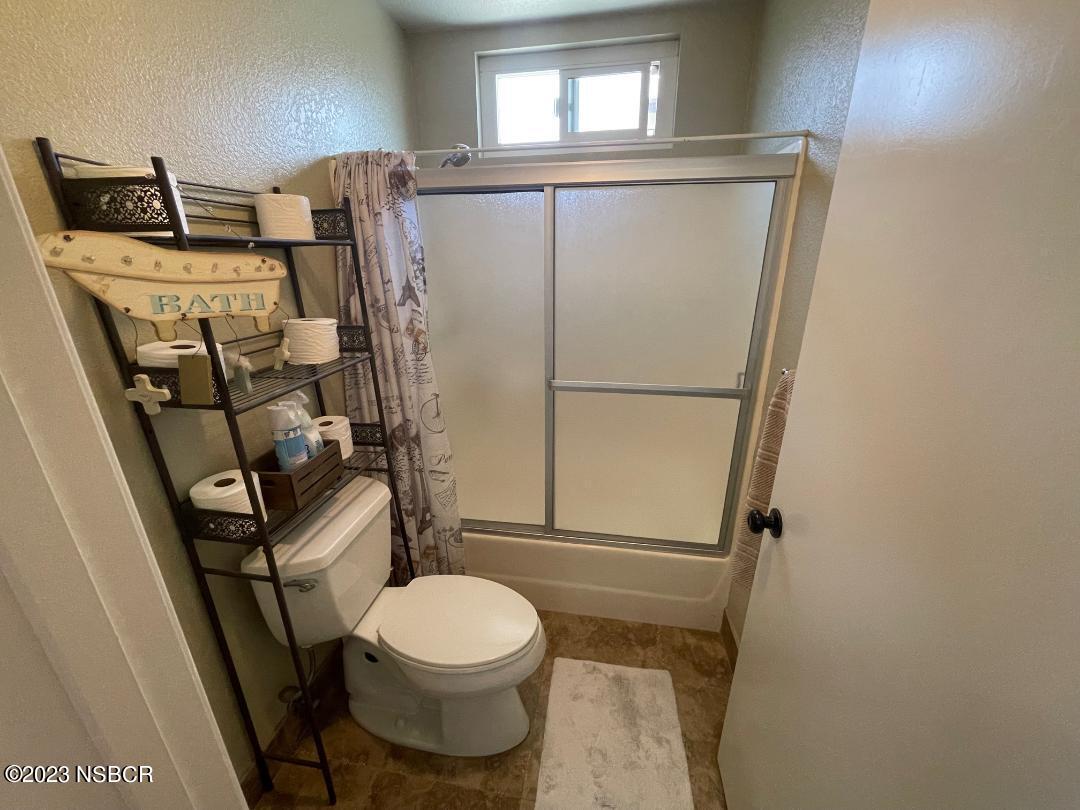 1108 Honeysuckle Way Lompoc, CA 93436 - Photo 8 of 54 a bathroom with a toilet and a shower