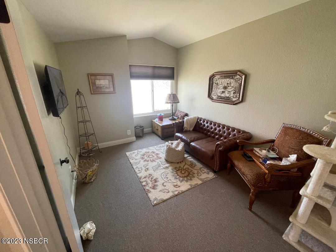 1108 Honeysuckle Way Lompoc, CA 93436 - Photo 9 of 54 a living room with furniture and a flat screen tv