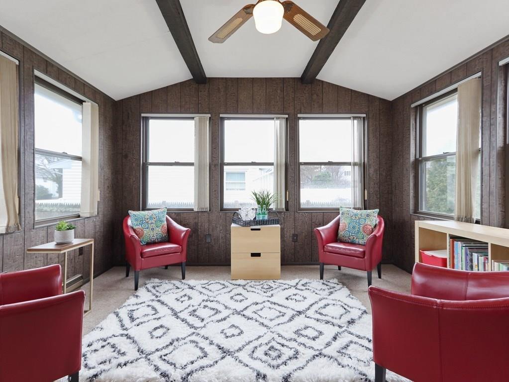 66 Anthony Road Newton, MA 02460 - Photo 15 of 39 a living room with furniture and large windows