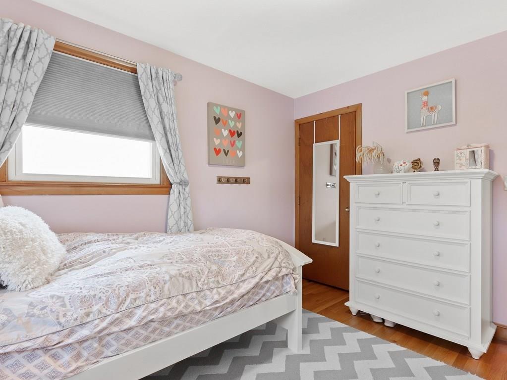 66 Anthony Road Newton, MA 02460 - Photo 24 of 39 a bedroom with a bed and a dresser