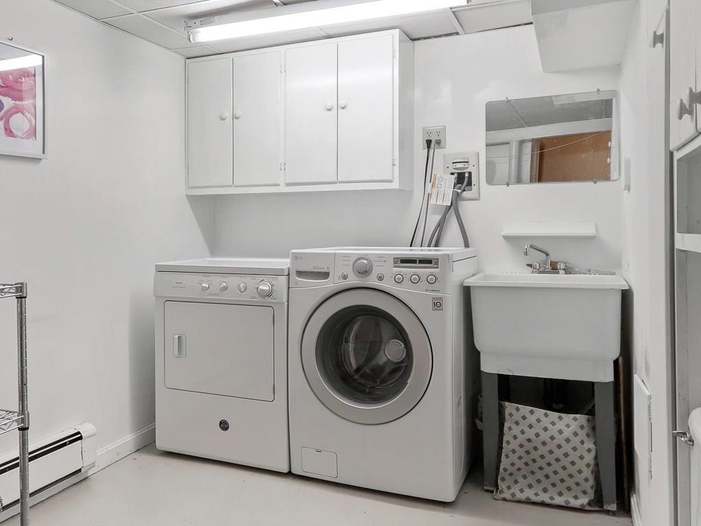 66 Anthony Road Newton, MA 02460 - Photo 26 of 39 a utility room with dryer and washer