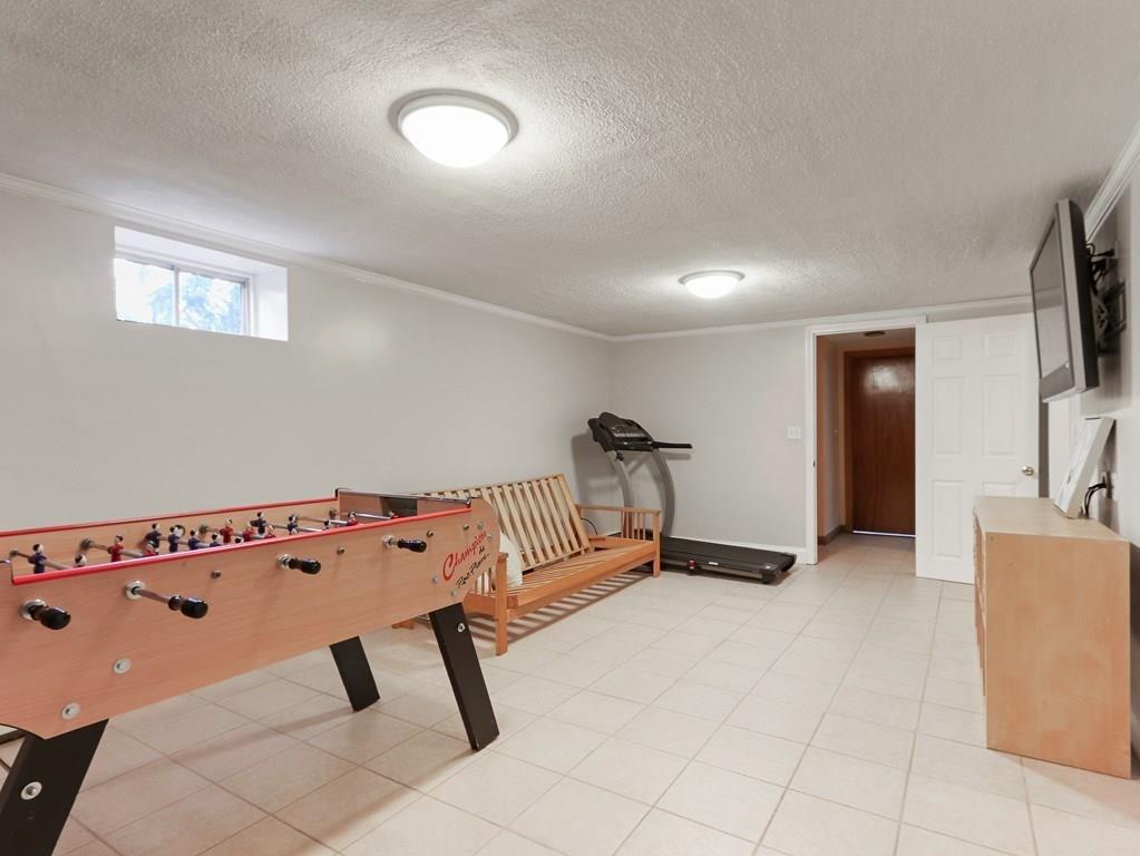 66 Anthony Road Newton, MA 02460 - Photo 30 of 39 a view of an empty room with a window