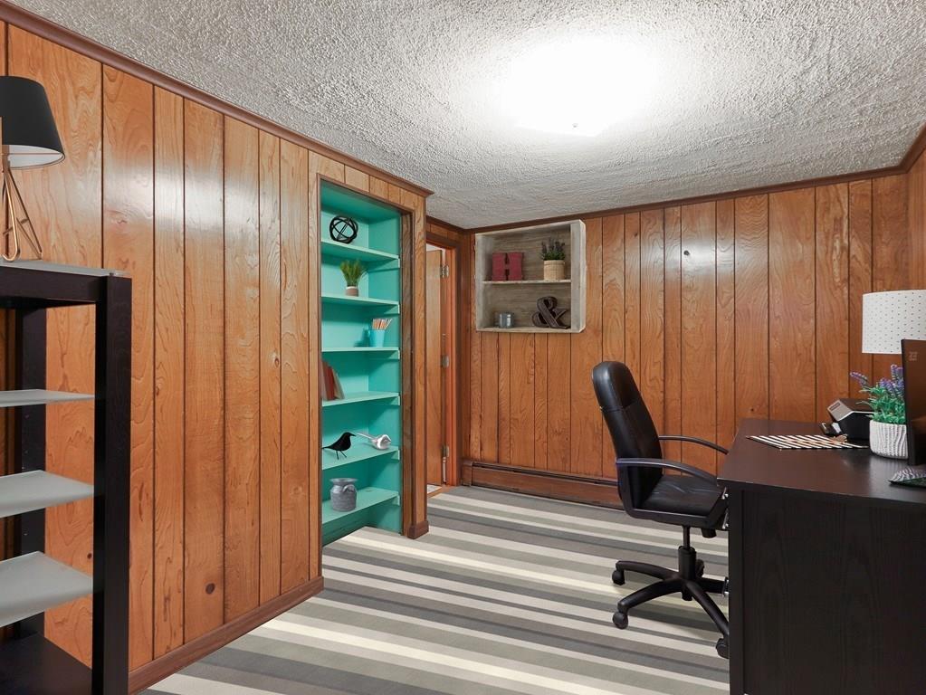 66 Anthony Road Newton, MA 02460 - Photo 33 of 39 a view of a workspace with furniture and stairs