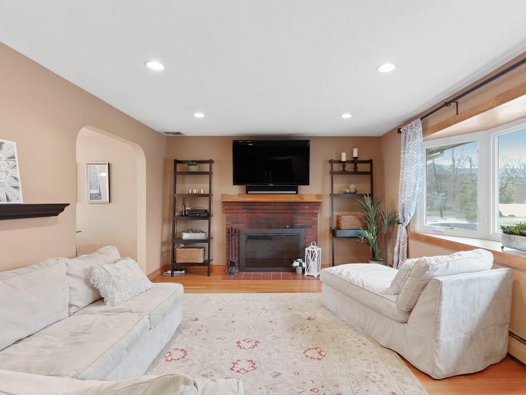 66 Anthony Road Newton, MA 02460 - Photo 5 of 39 a living room with furniture and a flat screen tv