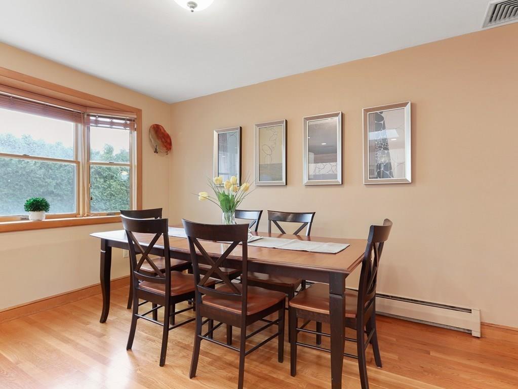 66 Anthony Road Newton, MA 02460 - Photo 7 of 39 a view of a dining room with furniture and wooden floor