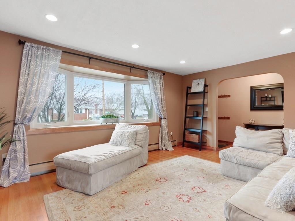 66 Anthony Road Newton, MA 02460 - Photo 9 of 39 a living room with furniture and a large window