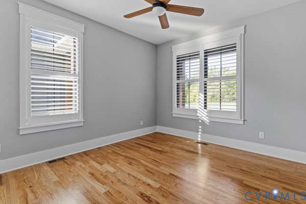 10512 River Road Chesterfield, VA 23838 - Photo 42 of 64 Hardwood flooring, two windows with plantation shu