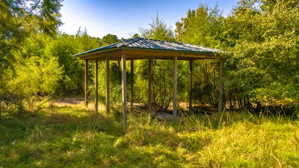 a view of swimming pool from a lake view