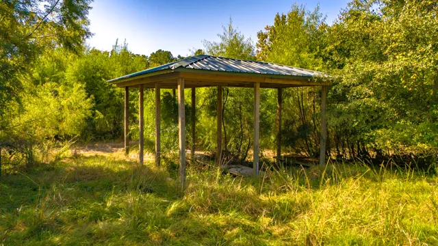 a view of swimming pool from a lake view