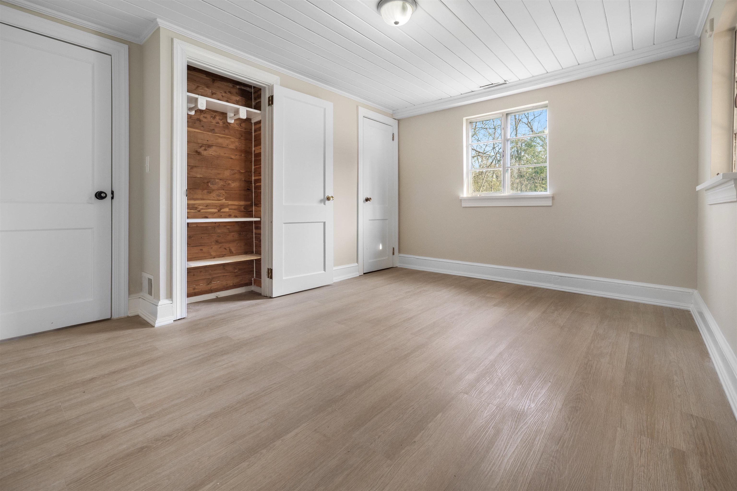 1641 Smithland Road Harrisonburg, VA 22802 - Photo 10 of 44 wooden floor in an empty room with a window