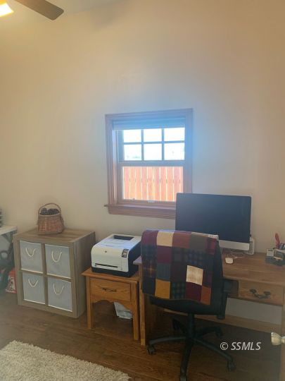 600 South Erin Street Ridgecrest, CA 93555 - Photo 31 of 39 a workspace with furniture and window