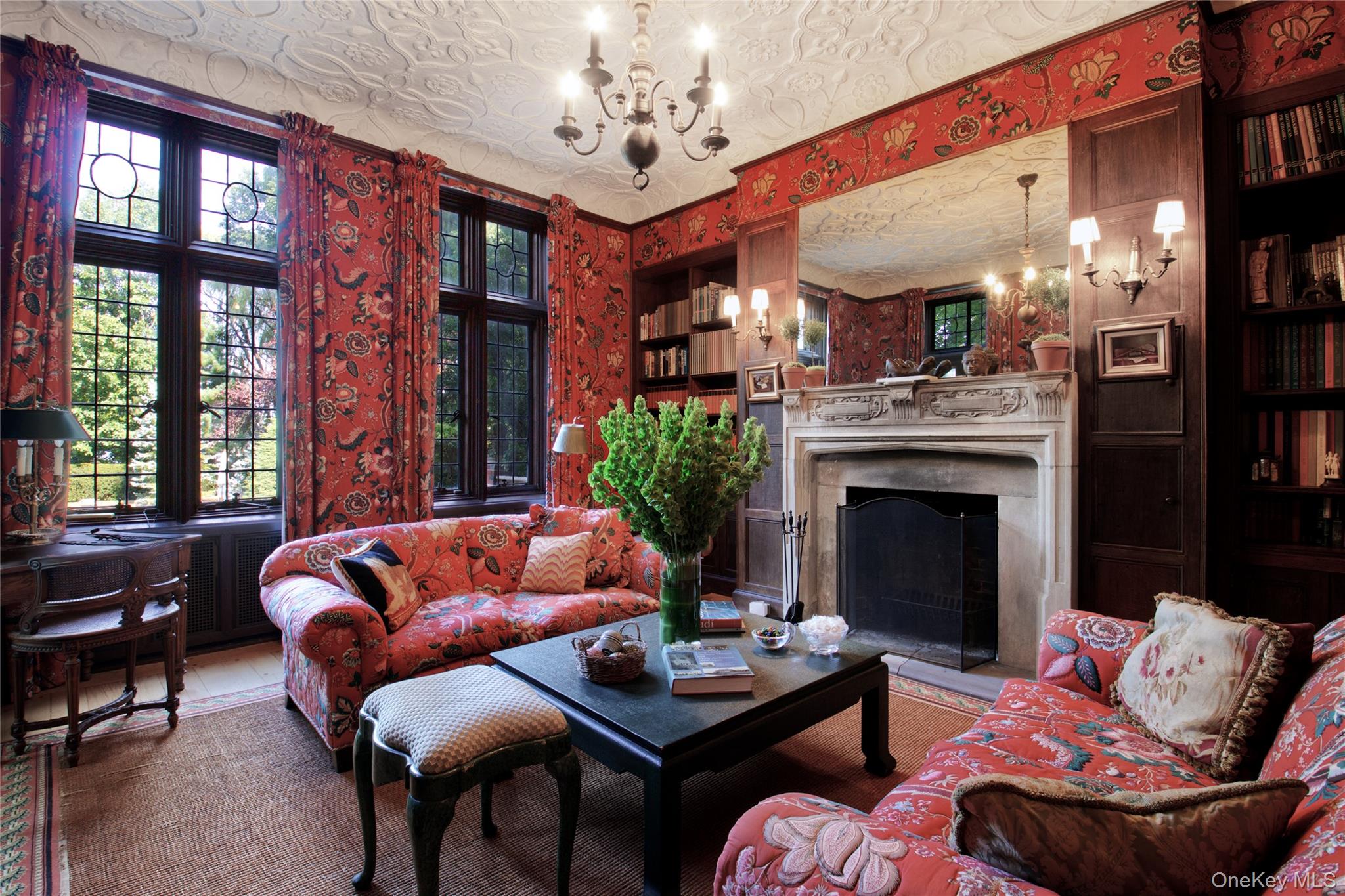 107 Bayview Road Manhasset, NY 11030 - Photo 12 of 40 a living room with furniture and a fireplace