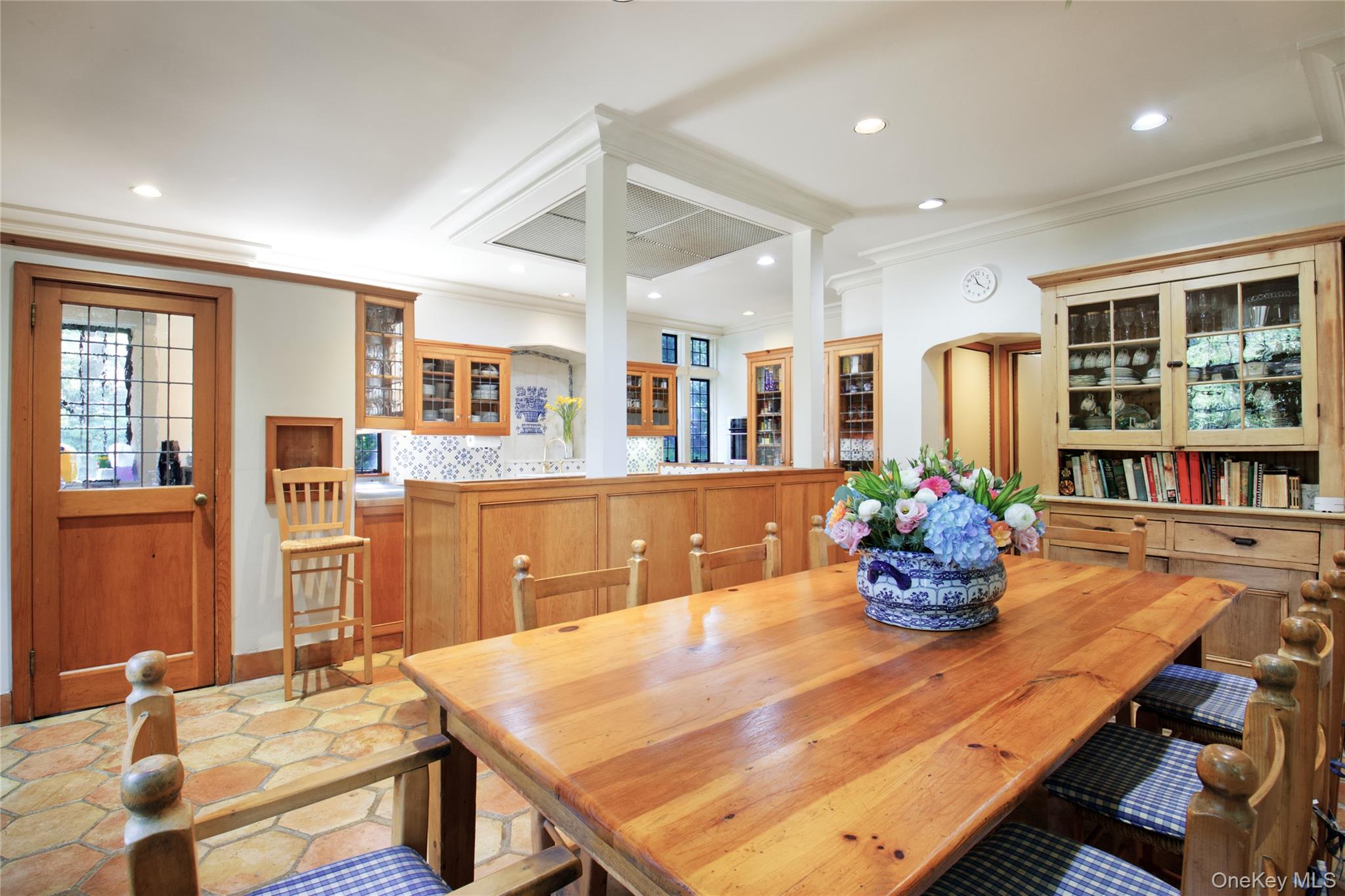 107 Bayview Road Manhasset, NY 11030 - Photo 17 of 40 a dining room with furniture and wooden floor