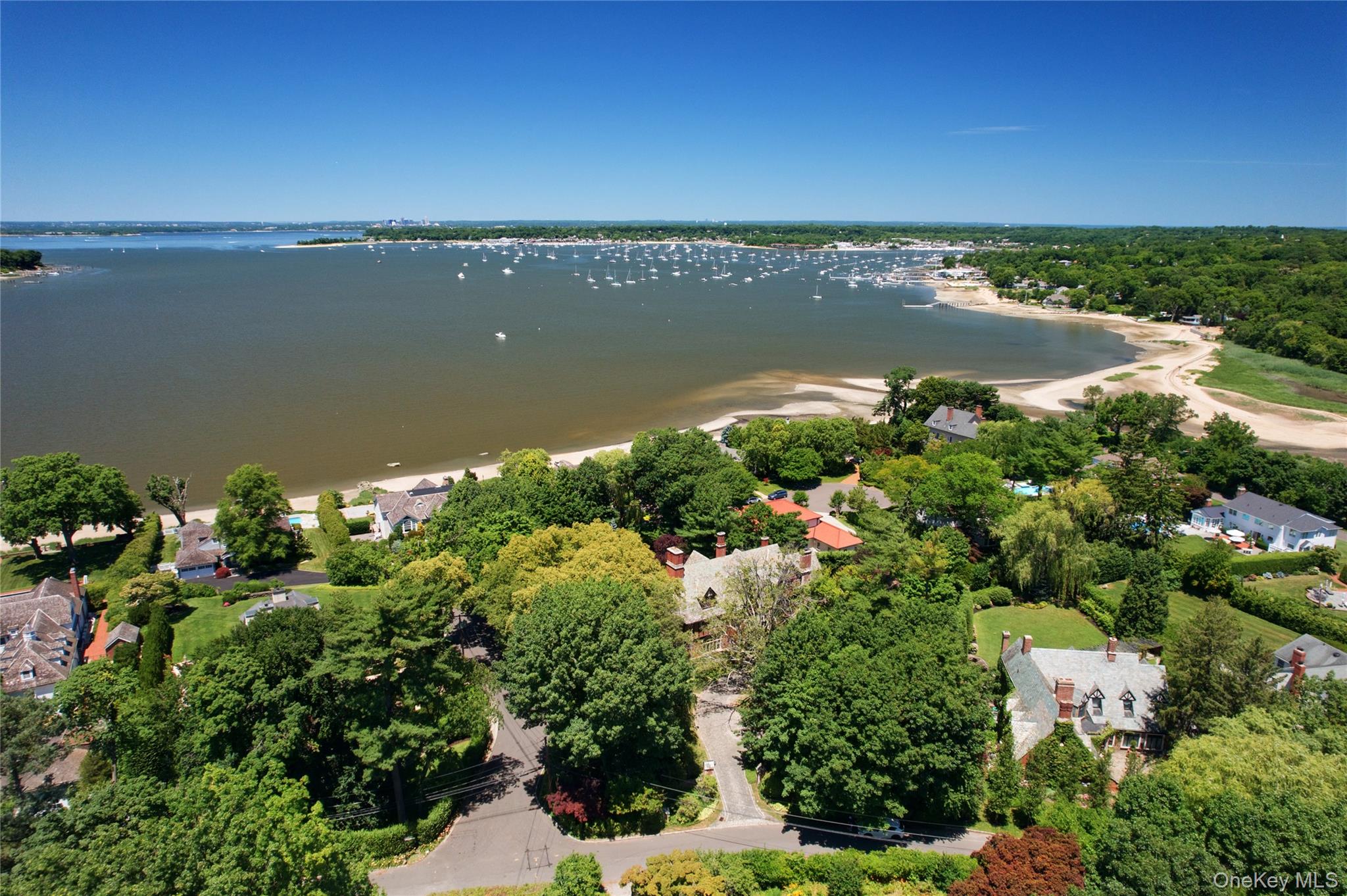 107 Bayview Road Manhasset, NY 11030 - Photo 33 of 40 a view of a lake with a city