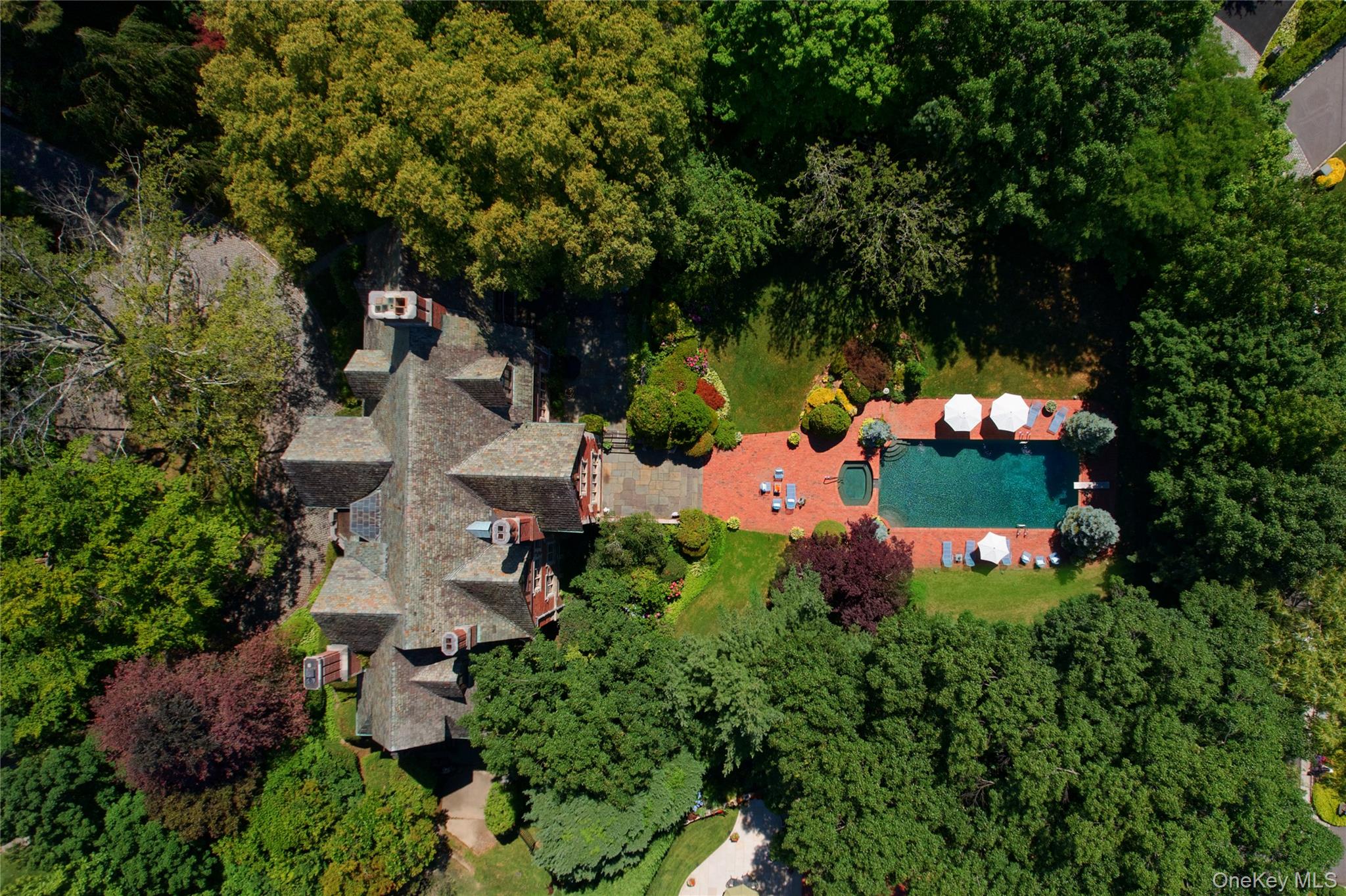 107 Bayview Road Manhasset, NY 11030 - Photo 35 of 40 an aerial view of a house with a yard