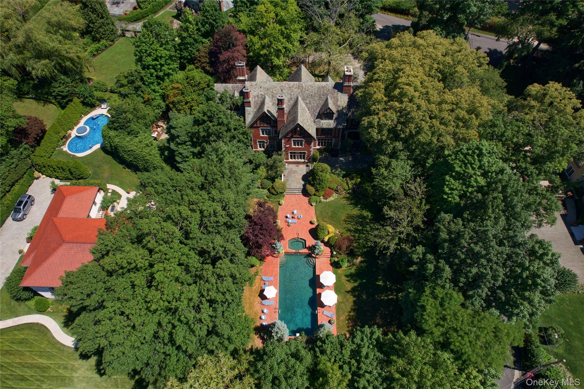 107 Bayview Road Manhasset, NY 11030 - Photo 40 of 40 an aerial view of house with swimming pool outdoor seating and yard