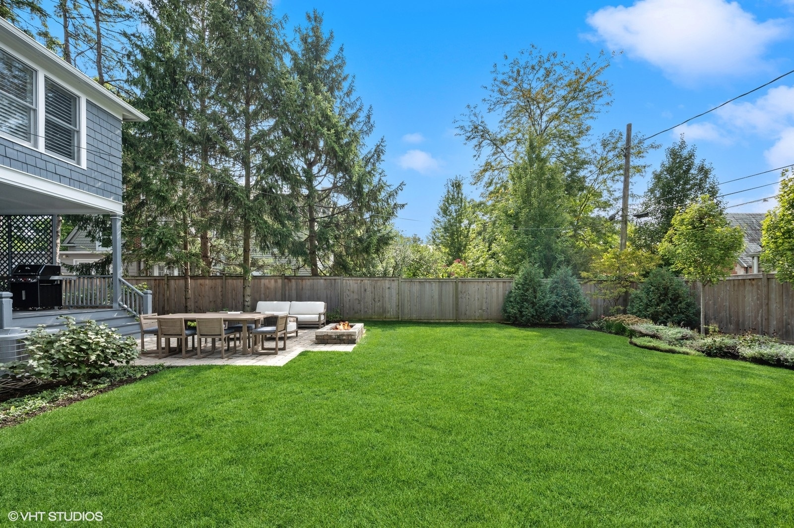 786 Locust Street Winnetka, IL 60093 - Photo 40 of 46 a view of a chair and table in backyard of the house