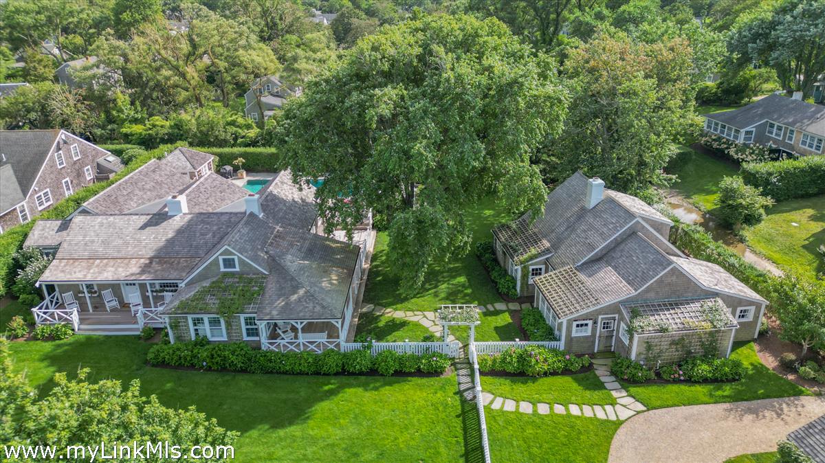14 & 16 Coffin Street Nantucket, MA 02554 - Photo 49 of 50 an aerial view of multiple houses with yard