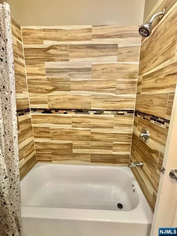 a bathroom with a toilet and a sink