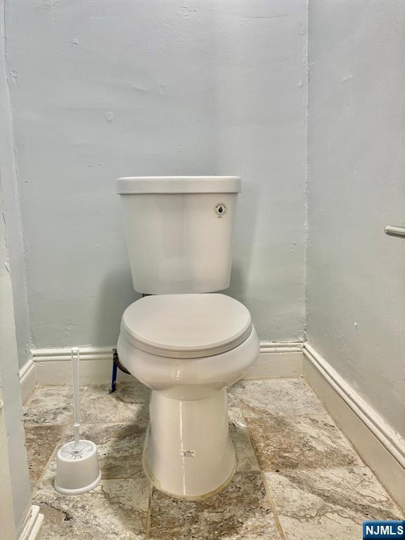 187 Shephard Avenue, Unit 1 Newark, NJ 07112 - Photo 18 of 18 a bathroom with a toilet and a sink