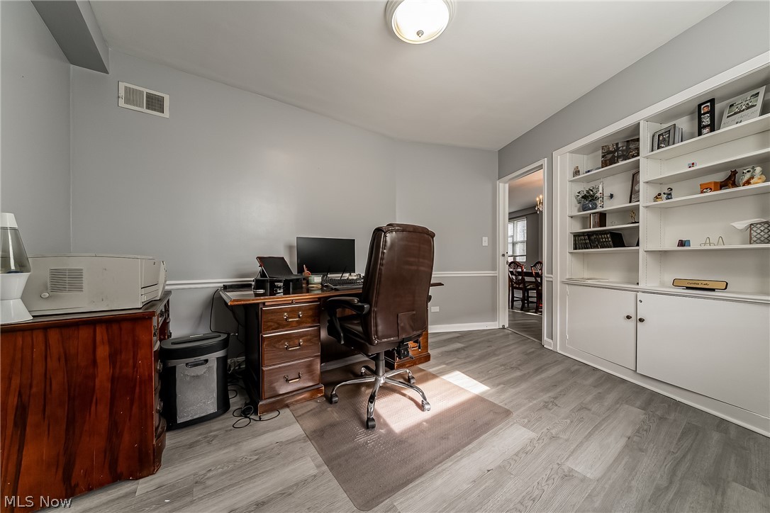 13800 Fairhill Road, Unit 306 Cleveland, OH 44120 - Photo 30 of 48 Office/bonus room with built-ins and its own separate access, offering flexible use as a private workspace, guest area, or potential 4th bedroom.