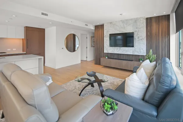 a large kitchen with a large counter top appliances and cabinets
