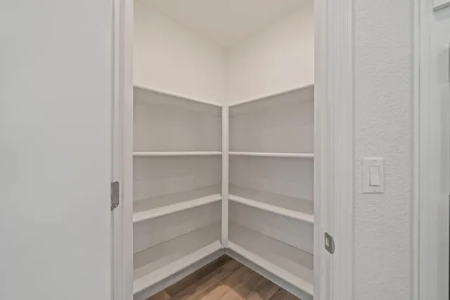 a view of a room with rack on the wall