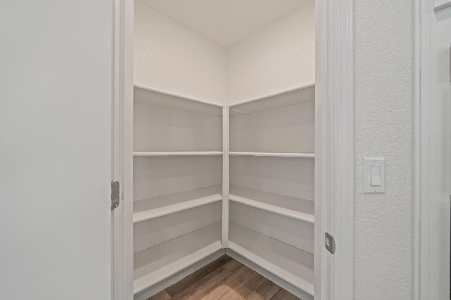 1602 Oleander Avenue Manteca, CA 95337 - Photo 20 of 52 a view of a room with rack on the wall