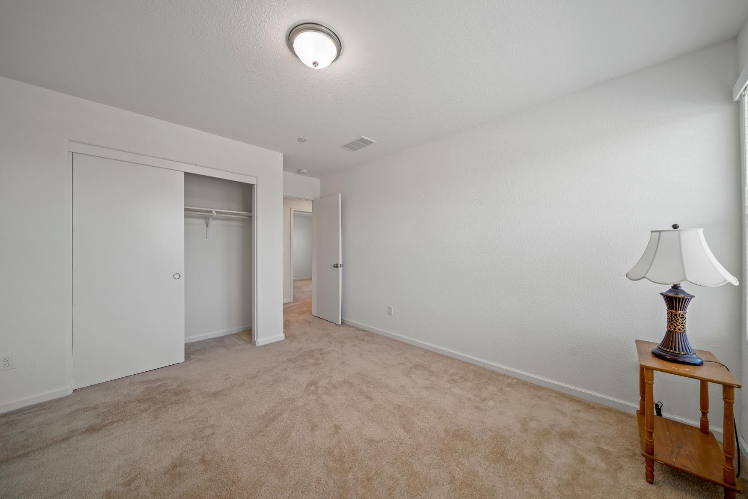1602 Oleander Avenue Manteca, CA 95337 - Photo 29 of 52 a view of an empty room with a window