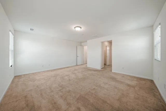 a view of a hallway with closet