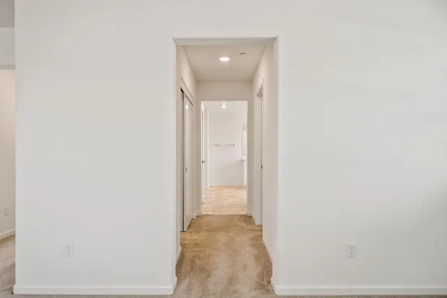 a view of an empty walk in closet