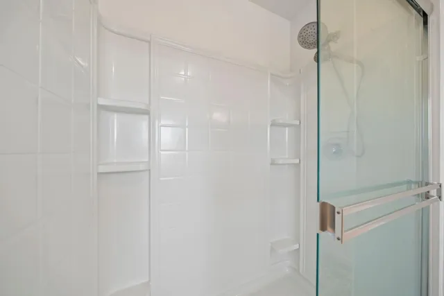 a bathroom with a sink a vanity and a mirror