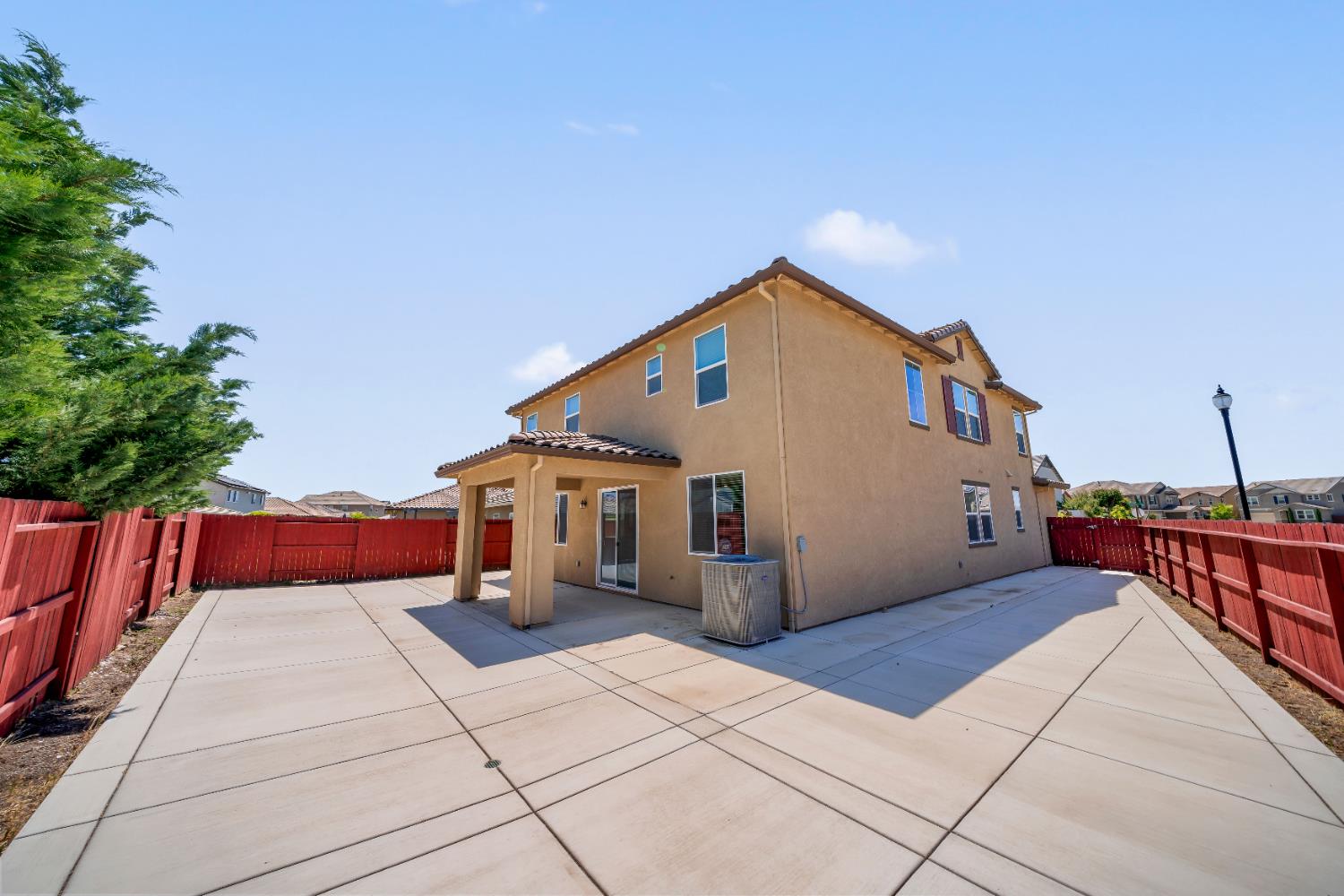 1602 Oleander Avenue Manteca, CA 95337 - Photo 45 of 52 a view of a house with backyard and sitting area