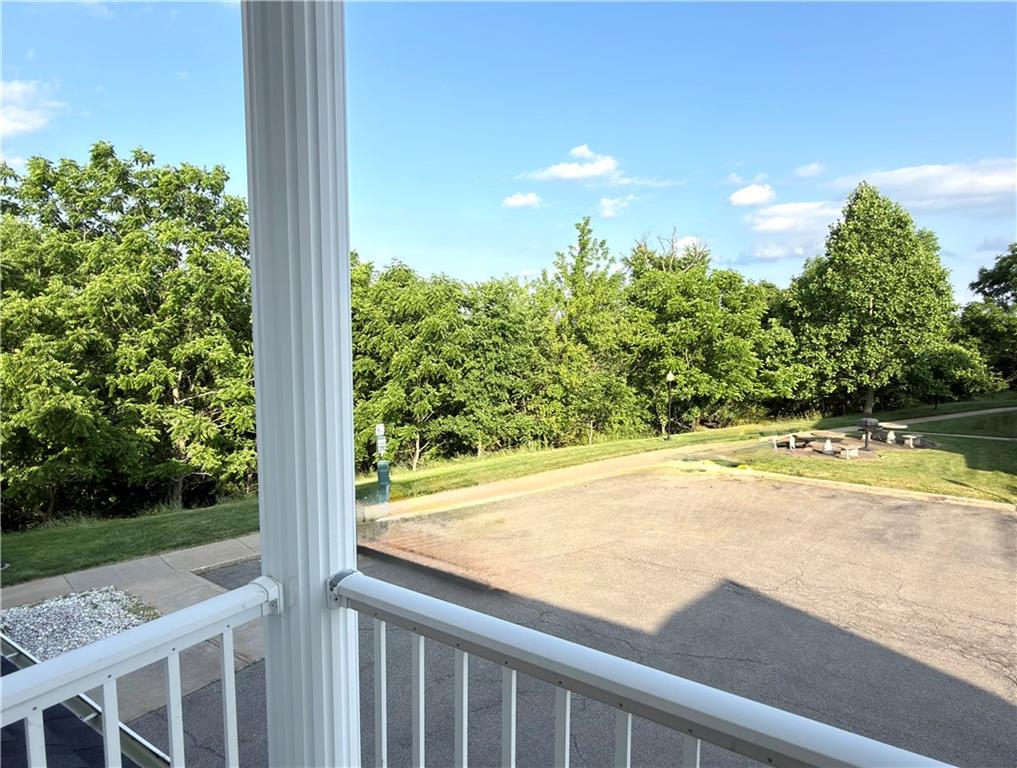 248 Adams Pointe Boulevard, Unit 2 Mars, PA 16046 - Photo 9 of 30 Private balcony off family rm- overlooking extra parking next to your door!