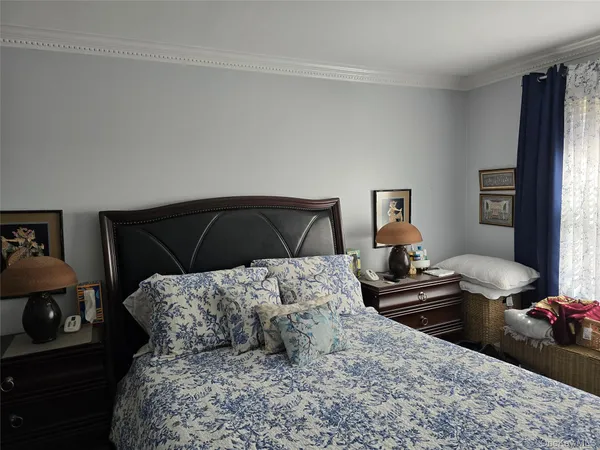 a bedroom with a bed and a closet
