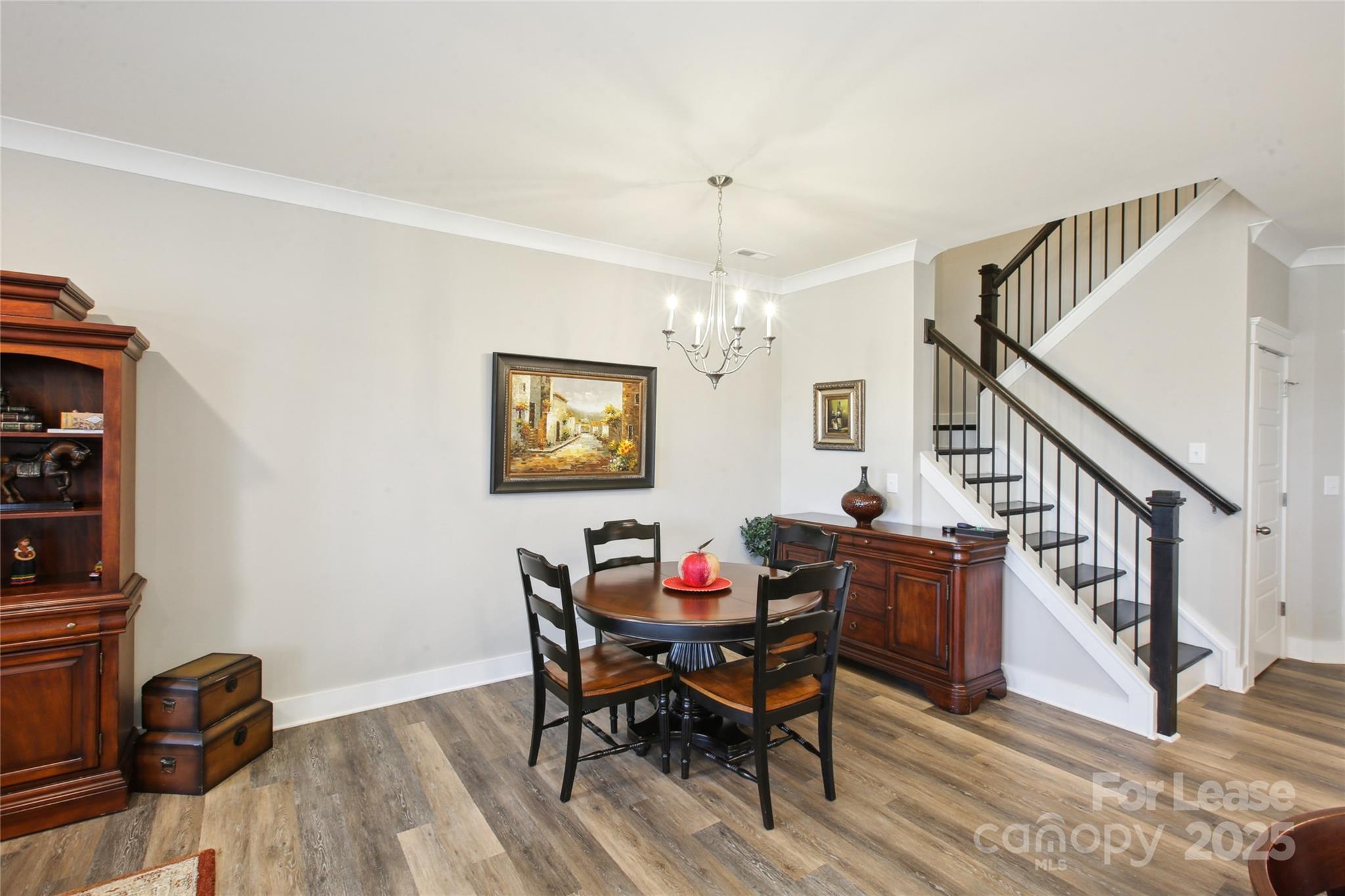 2126 Bexar Trail Matthews, NC 28105 - Photo 2 of 12 a view of a livingroom with furniture and wooden floor