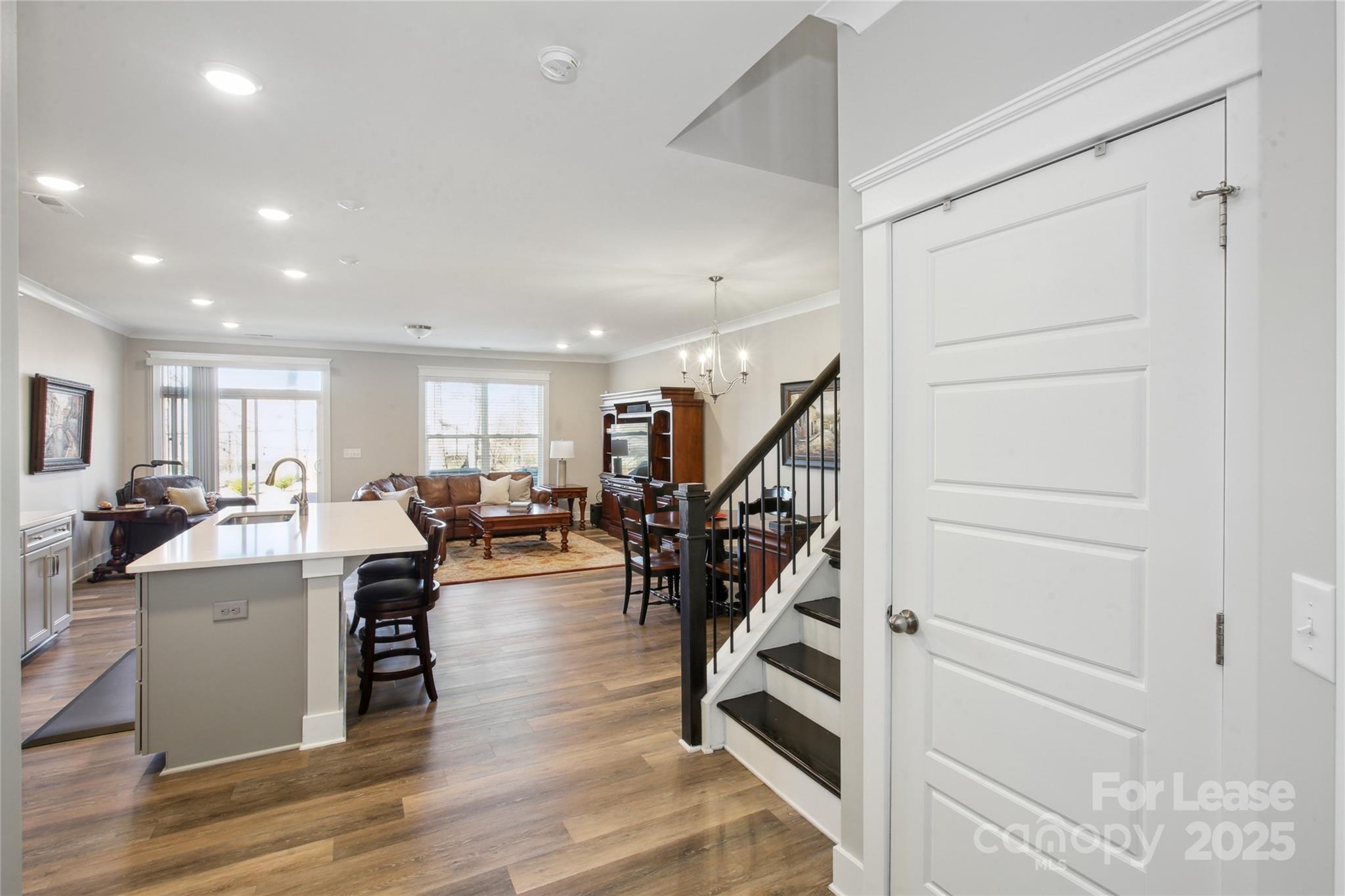 2126 Bexar Trail Matthews, NC 28105 - Photo 7 of 12 a view of a living room and kitchen
