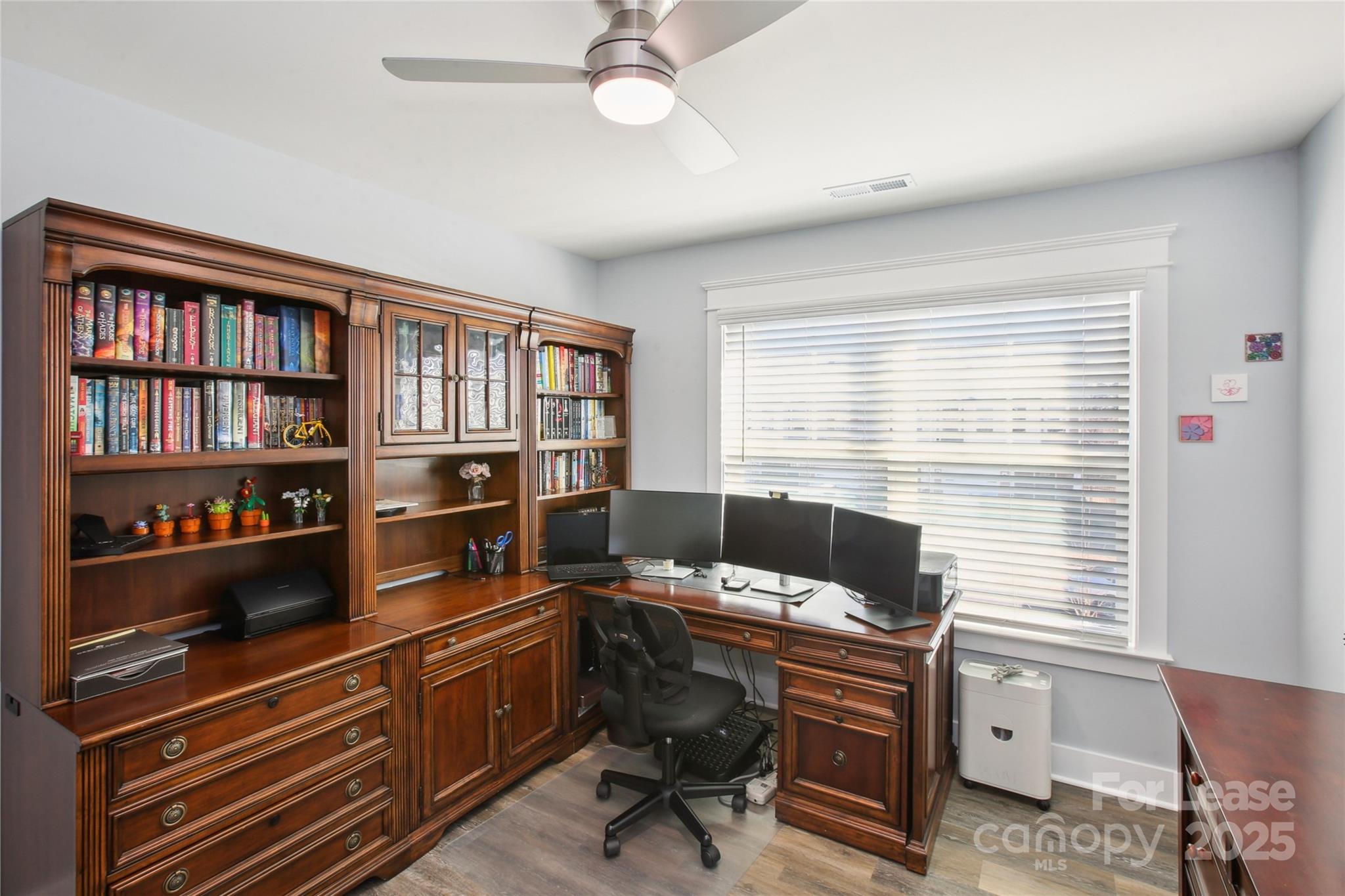 2126 Bexar Trail Matthews, NC 28105 - Photo 10 of 12 a livingroom with workspace and a window
