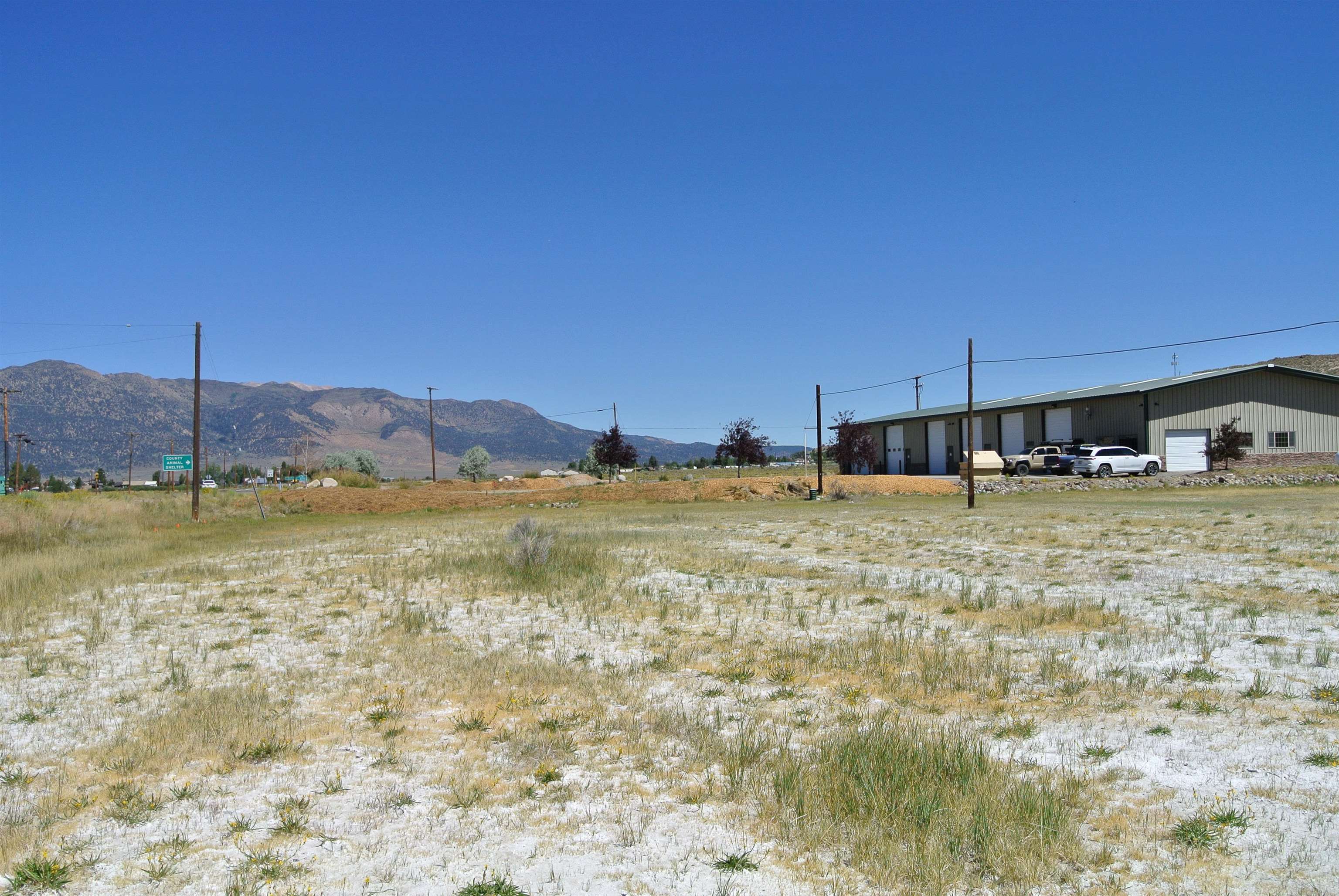 View of yard featuring a view of countryside and a mountain view