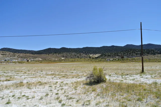 a view of mountain with lake view