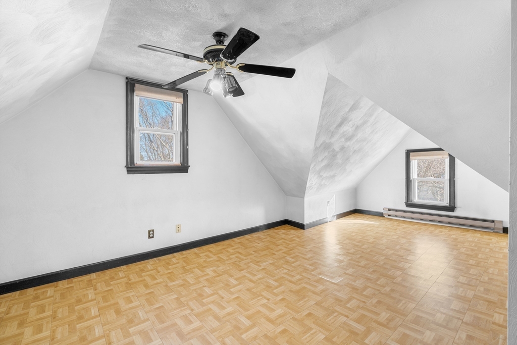 32 Beach Street Malden, MA 02148 - Photo 19 of 31 a view of an empty room with a window