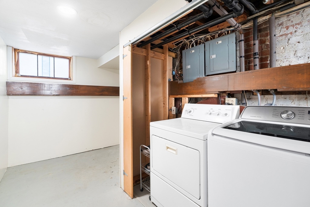 32 Beach Street Malden, MA 02148 - Photo 26 of 31 a utility room with dryer and washer
