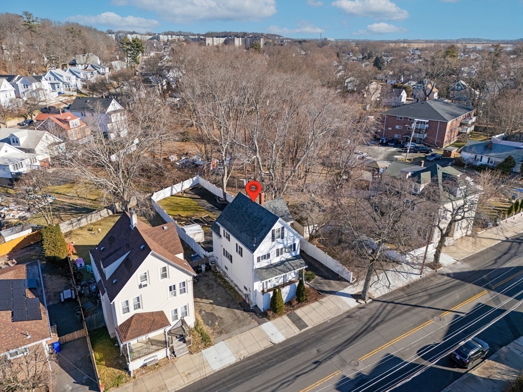 32 Beach Street Malden, MA 02148 - Photo 30 of 31 an aerial view of a house with a mountain