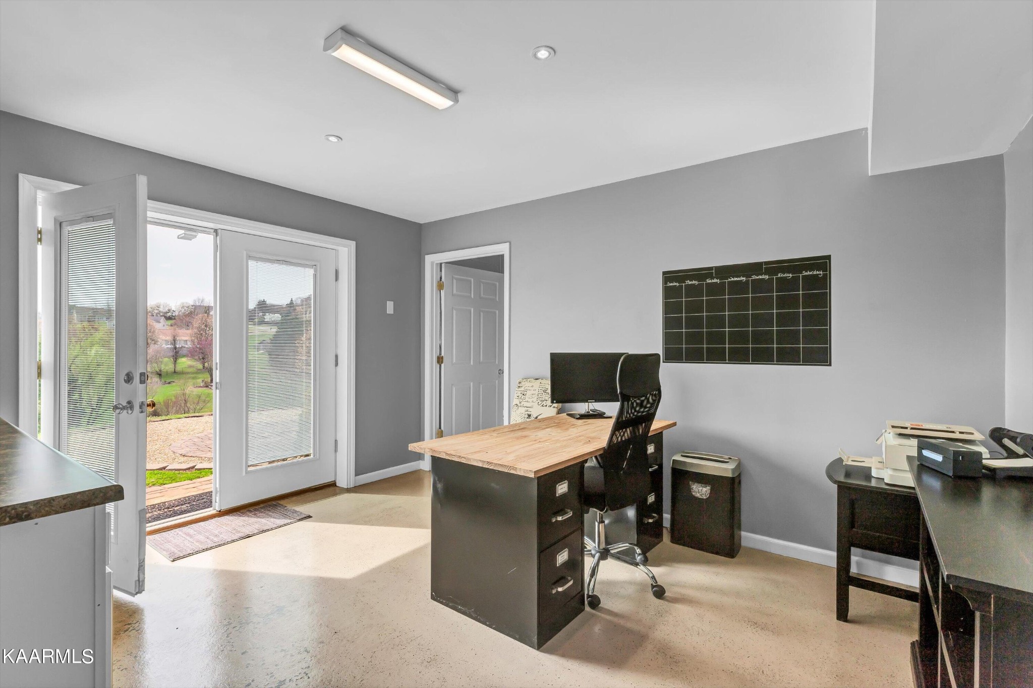 1433 Lambert Road Greenback, TN 37742 - Photo 23 of 34 a view of a workspace with furniture and a window